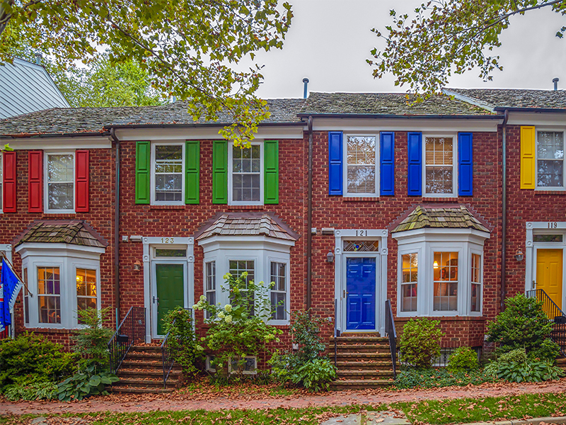 Facade of multi-colored homes in Gaithersburg
